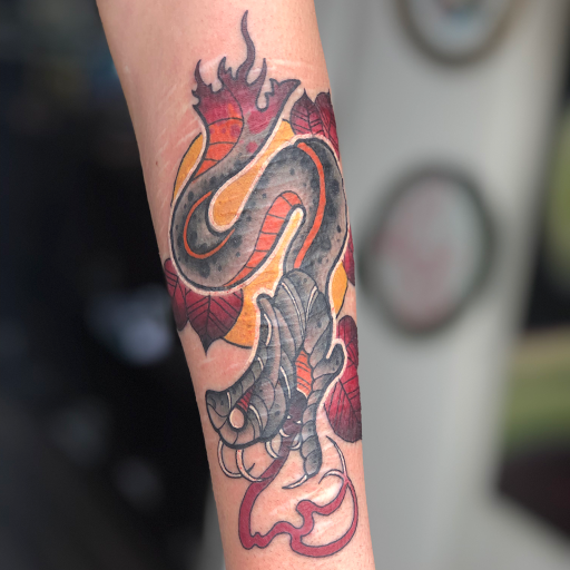 Explore skiing tattoo ideas, creative tattoo ideas in Prescott, available at BlackGold Tattoo