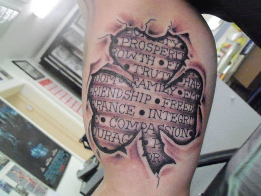 Explore hip bone tattoo ideas, creative tattoo ideas in Pelham, available at Tattoo Fever