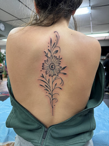 Explore land before time tattoo ideas, creative tattoo ideas in Vincennes, available at Silver Owl Tattoo