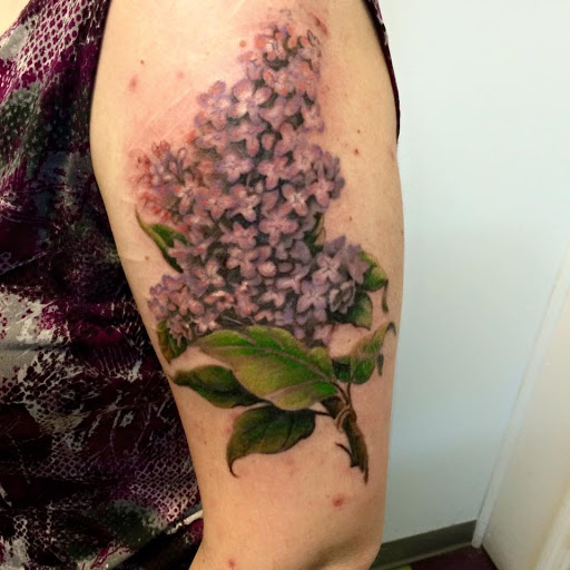 Explore honeybee tattoo ideas, creative tattoo ideas in La Porte, available at Artistic Outcasts Tattooing