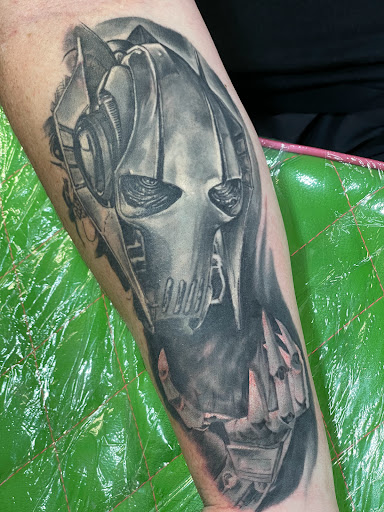 Explore finger cover up tattoo ideas, creative tattoo ideas in Broken Arrow, available at Geek Ink Tattoo and Piercings