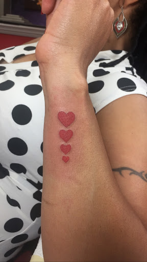 Explore female neck tattoo ideas, creative tattoo ideas in Gretna, available at Crest coast tattoo & Art gallery