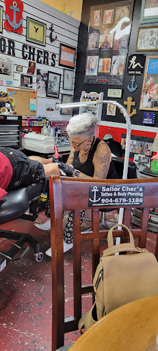 Find tattoo ideas under breast for your next unique tattoo in Saint Augustine at Sailor Chers Tattoo & Body Piercing