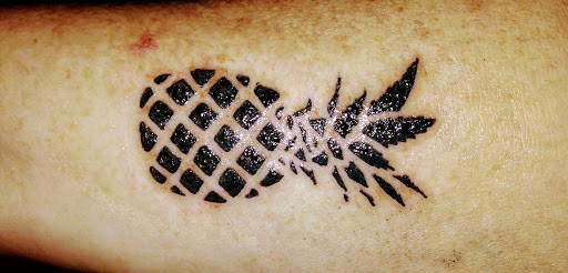 Explore sun tattoo ideas for guys, creative tattoo ideas in Kailua Kona, available at Lady Luck Tattoo & Body Piercing