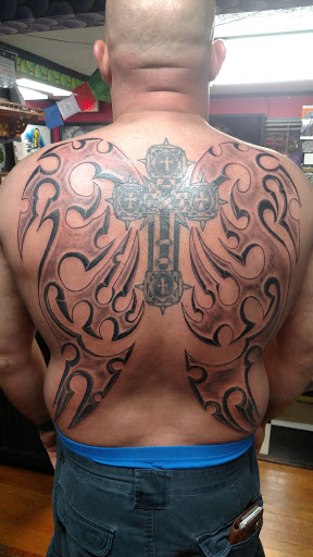 Tattoo Shop «Art In Motion Inc Tattooing», reviews and photos, 415 S Broadway St, Medina, OH 44256, USA