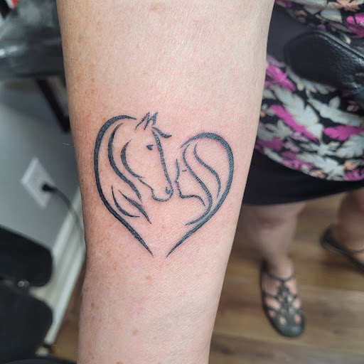 Explore tattoo ideas for my son's name, creative tattoo ideas in Naples, available at Webbworks Tattoo Studio