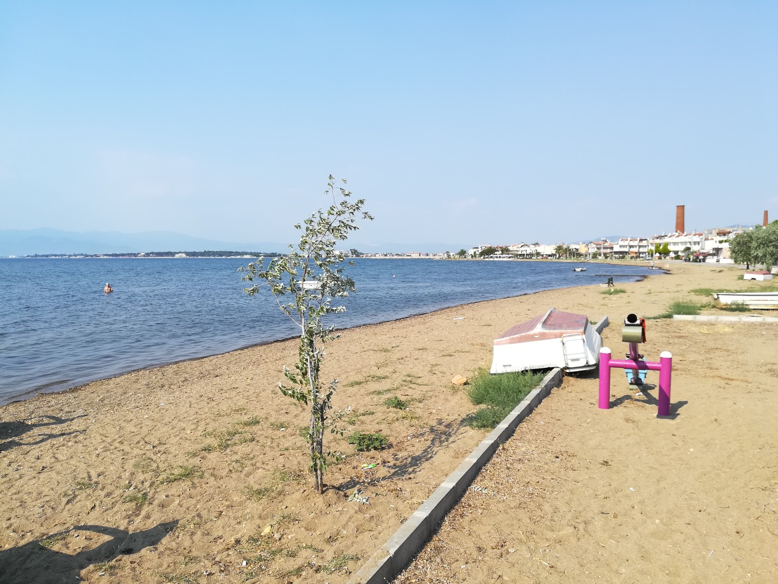 Foto af Tekco Cafe beach med lys sand overflade