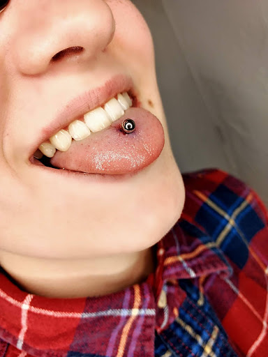 Find underboob tattoo ideas for your next unique tattoo in Springfield at Ink Ink Tattoo & Piercing Studio