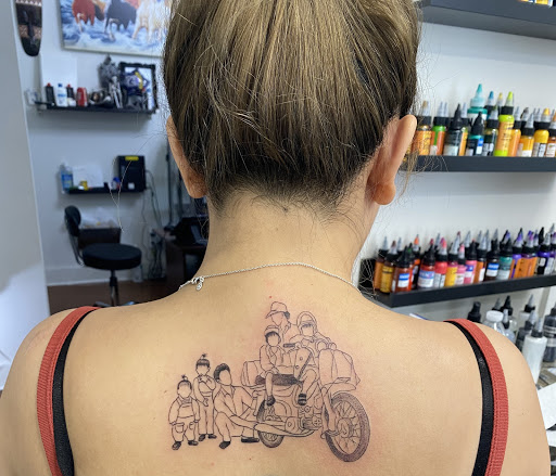 Explore above knee tattoo ideas, creative tattoo ideas in Carmel, available at Phong Tattoo