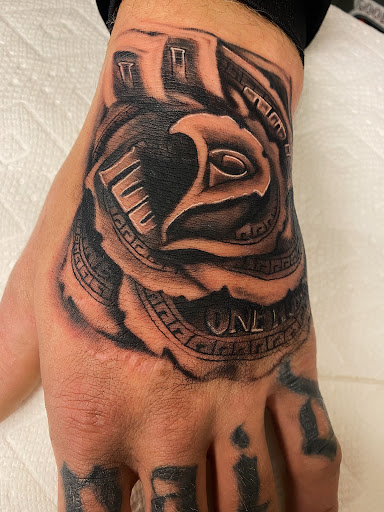 Explore floral tattoo cover up ideas, creative tattoo ideas in Concord, available at Sterling Tattoo Club