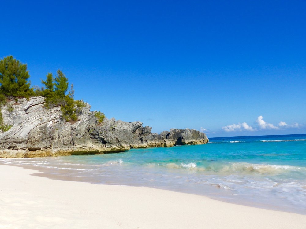 Fotografija Long Bay Beach z turkizna čista voda površino