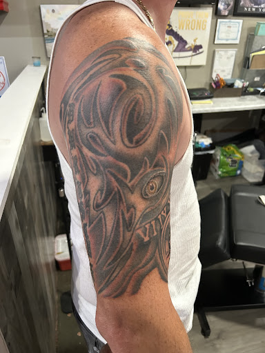 Explore cartoon tattoo ideas for men, creative tattoo ideas in Cape Coral, available at UNRIVALED INK