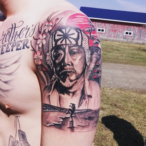 Find playboy bunny tattoo ideas for your next unique tattoo in Owosso at Expressions Body Art Studio