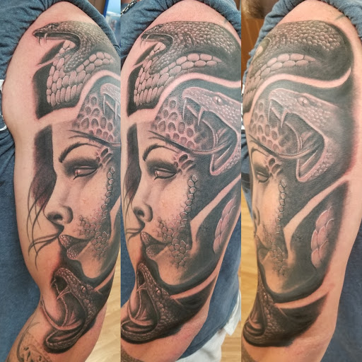 Explore dagger tattoo ideas, creative tattoo ideas in Wheeling, available at SPFX Tattoo