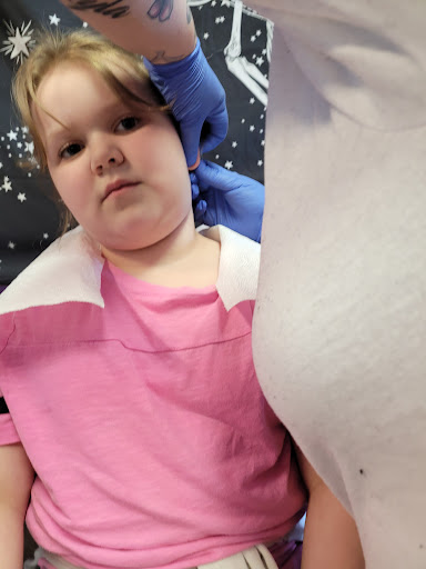 Explore neck tattoo ideas for females, creative tattoo ideas in Shelbyville, available at Moonstone Tattoo and Piercing Parlor