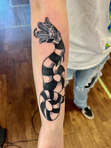 Explore design tattoo ideas for men, creative tattoo ideas in Rogers, available at Ink Solutions Tattoo