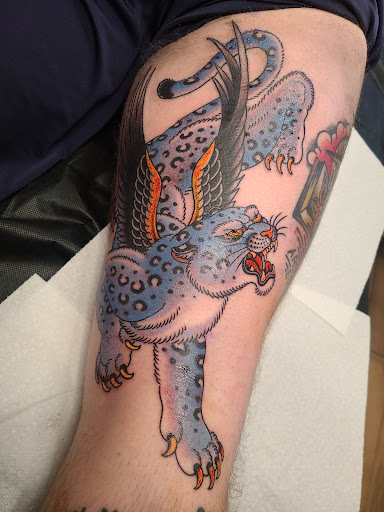 Explore tattoo ideas for womens thigh, creative tattoo ideas in Santa Fe, available at Shrine Tattoo