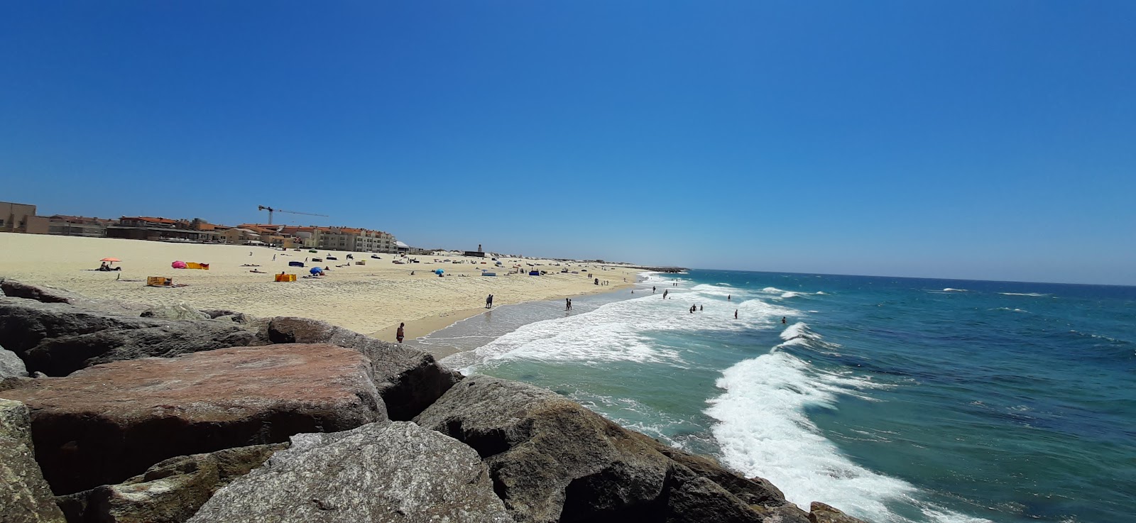 Photo of Praia da Costa Nova with turquoise pure water surface