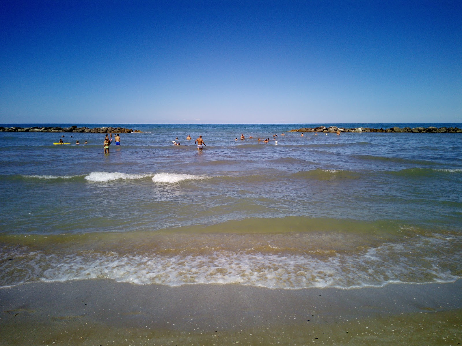 Oasi Beach的照片 带有直岸