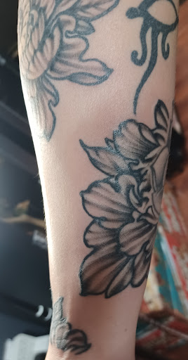 Explore small thigh tattoo ideas, creative tattoo ideas in Shippensburg, available at LAZY WIZARD TATTOOS