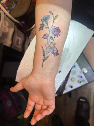 Explore rip neck tattoo ideas, creative tattoo ideas in Mobile, available at Brothers Ink Tattoo Parlor