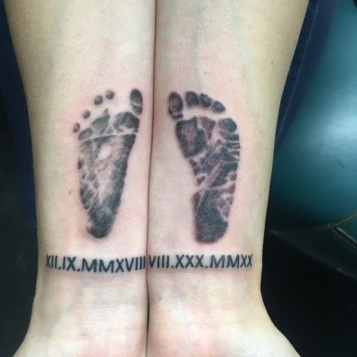 Explore growth tattoo ideas, creative tattoo ideas in Monticello, available at 850 Tattoo Co.