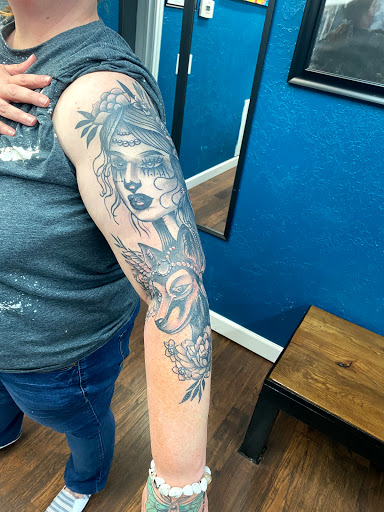 Explore upper back tattoo cover up ideas, creative tattoo ideas in Martin, available at Southern Ink Tattoos & Piercings