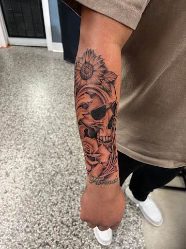 Explore bottom leg tattoo ideas, creative tattoo ideas in Sanford, available at Luv Ink