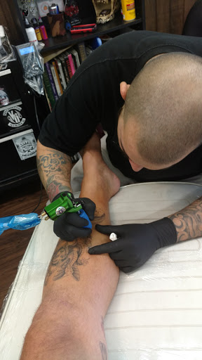 Explore japanese writing tattoo ideas, creative tattoo ideas in Orange, available at Leftys Tattoo