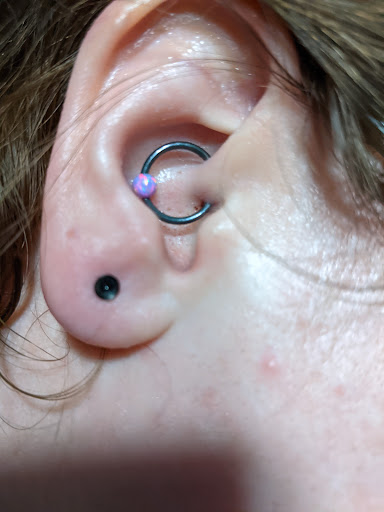 Explore coco tattoo ideas, creative tattoo ideas in Erie, available at Sacred Piercing