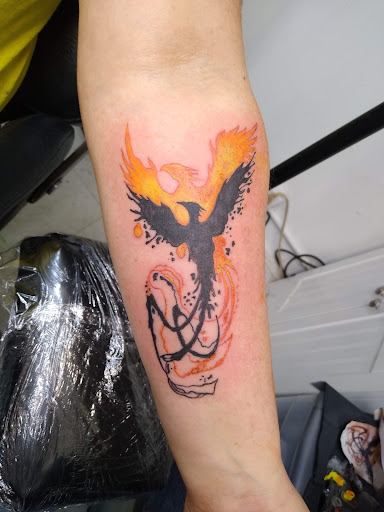 Explore hour glass tattoo ideas, creative tattoo ideas in Salem, available at Outwest Tattoo and body piercing ,30 years of tattooing,only life time guarantee