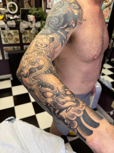 Explore tribal back tattoo ideas, creative tattoo ideas in Georgetown, available at Iron Rite Tattoo South