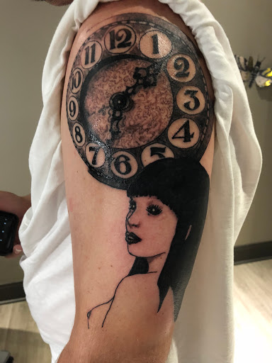 Explore december birth flower tattoo ideas, creative tattoo ideas in Chattanooga, available at Studio 222