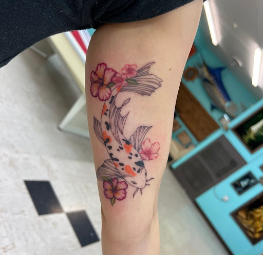 Explore woman sleeve tattoo ideas, creative tattoo ideas in Everett, available at Sunken Ship Tattoos