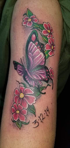 Explore small beach tattoo ideas, creative tattoo ideas in Angola, available at Hoodlum Ink