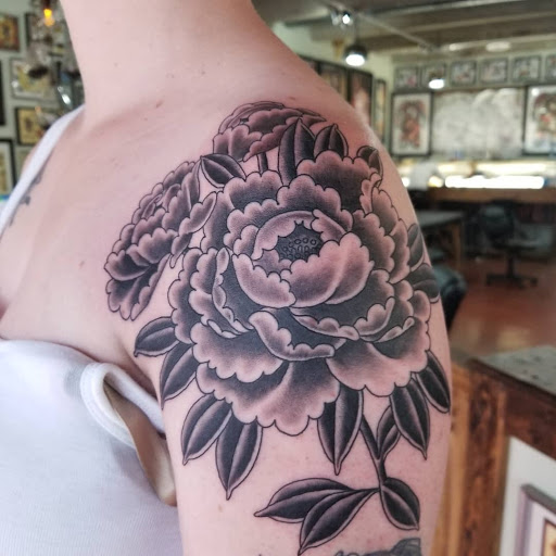 Explore anti government tattoo ideas, creative tattoo ideas in Salt Lake City, available at Tiger Claw Tattoo