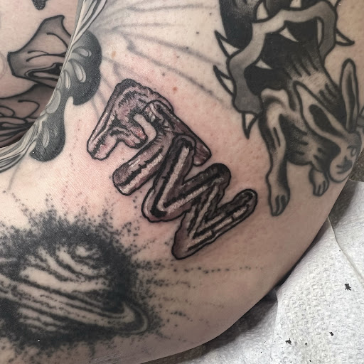 Find gay tattoo ideas for guys for your next unique tattoo in Buffalo at True Gloom Tattoo Studio