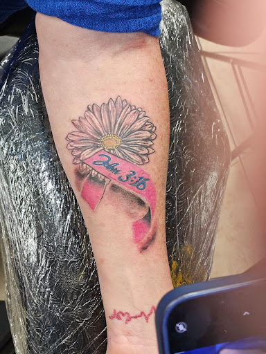 Find breast tattoo ideas for females for your next unique tattoo in Houston at 333 Tattoo Studio HTX