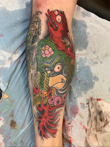 Explore mens inner bicep tattoo ideas, creative tattoo ideas in Harrisonburg, available at Alley Cat Tattoo