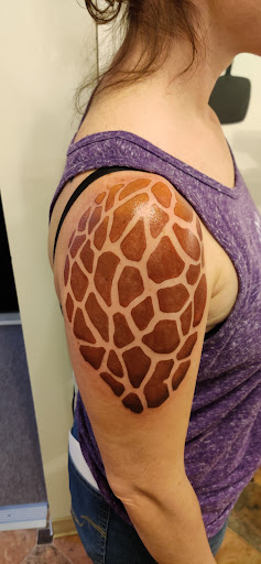 Explore skull tattoo ideas for women, creative tattoo ideas in Hebron, available at Explosive Ink Tattoo