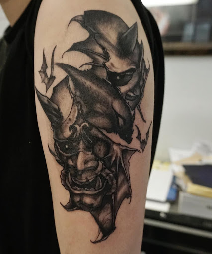 Find angel tattoo ideas for guys for your next unique tattoo in Clinton at Black Relic Tattoo