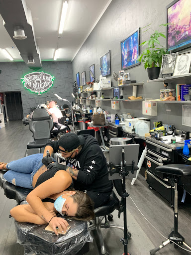 Explore barber tattoo ideas, creative tattoo ideas in Hollywood, available at Sacred Eye Tattoos
