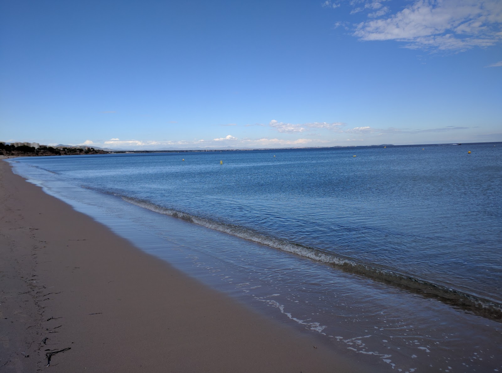 Foto di Platja Cristall con una superficie del sabbia beige