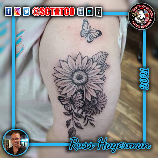 Explore small lion tattoo ideas, creative tattoo ideas in Fayetteville, available at Southern Customs Tattoo Company