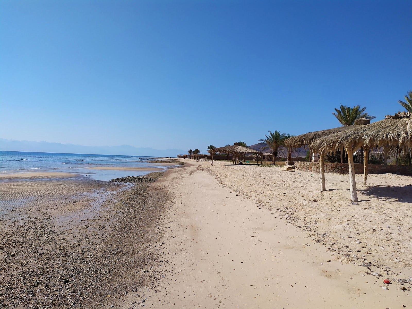 Photo of Friends Camp beach with turquoise water surface