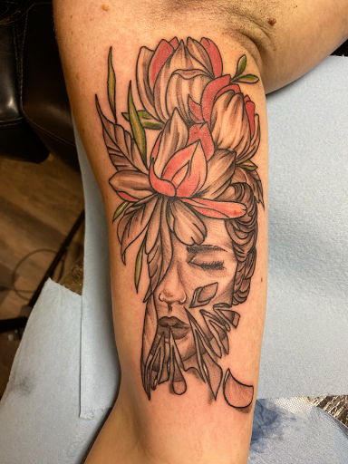 Explore bow tattoo ideas, creative tattoo ideas in Warner Robins, available at Untold Pain Tattoo Studio