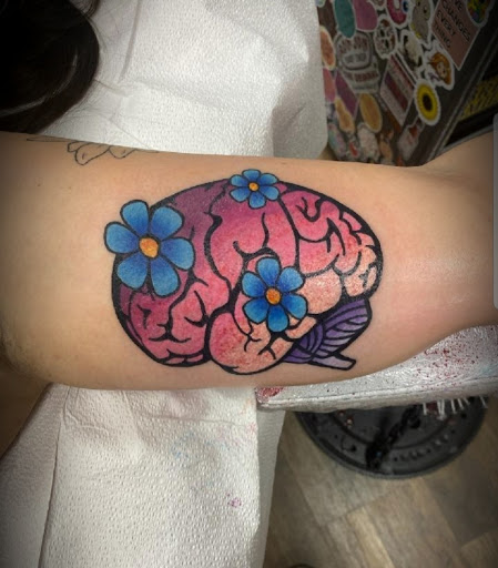 Explore letter t tattoo ideas, creative tattoo ideas in Abington, available at Tattoo Galaxy (Abington) Piercing and Custom Tattoos