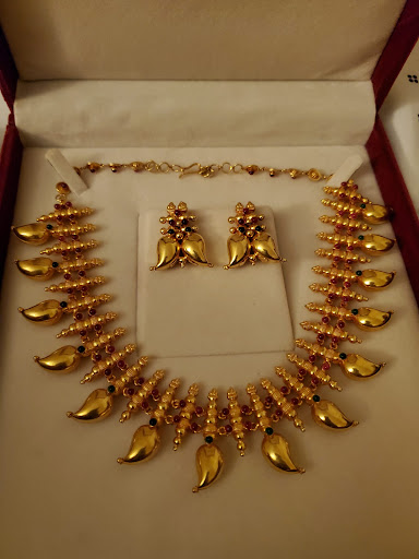 Jewelry Store «Malani Jewelers, Dallas (TX) - 22Kt Gold & Diamond Jewelry», reviews and photos, 300 S Central Expy, Richardson, TX 75080, USA