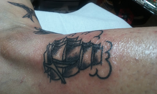 Explore lower stomach tattoo ideas, creative tattoo ideas in Los Angeles, available at Tinta Rebelde hardcore tattoo