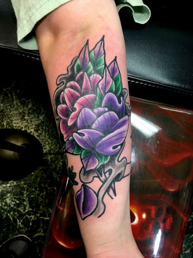 Explore father daughter matching tattoo ideas, creative tattoo ideas in Covington, available at Cupid Slave Tattoo Company